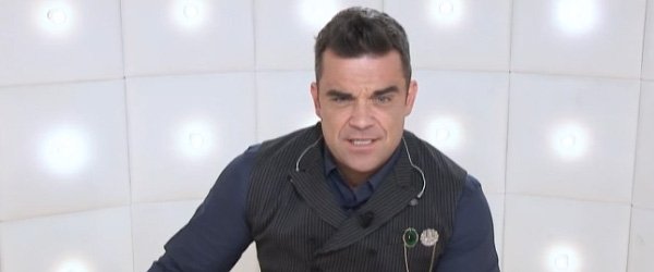 Robbie imite Brad Pitt !